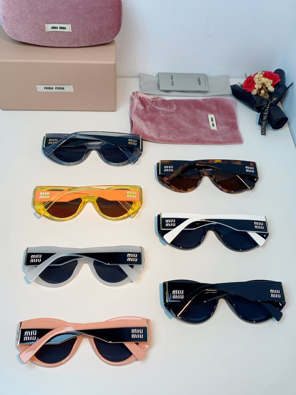 Miu Miu Polarized Cat-Eye Gray Lens Sunglasses for Men & Women - detail image 11