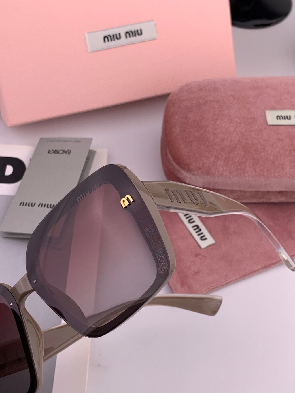 Miu Miu M5550 Fashion Black Lens Sunglasses for Men & Women - detail image 3